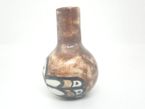 Miniature handmade small brown ceramic Peruvian vase with bird