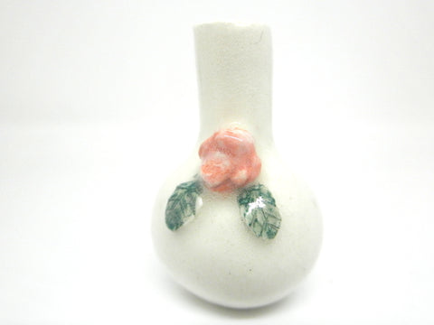 Miniature ceramic vase with pink rose