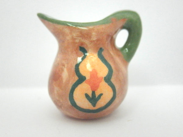 Miniature pitcher with tulip medallion
