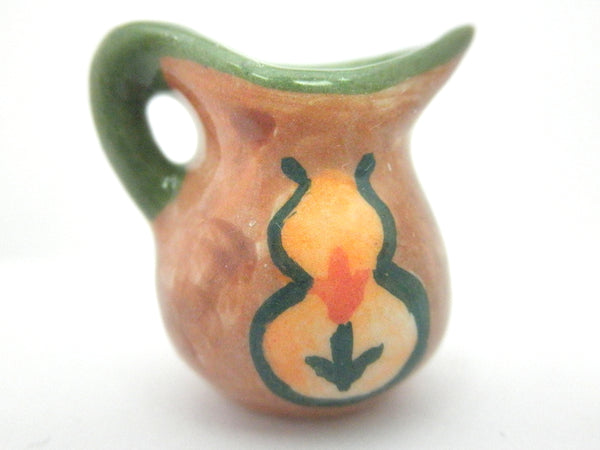 Miniature pitcher with tulip medallion