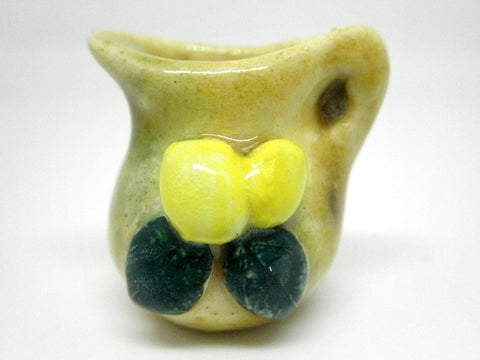 Miniature Italian pitcher with lemons