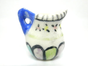 Miniature hand painted pitcher with pastel stripes