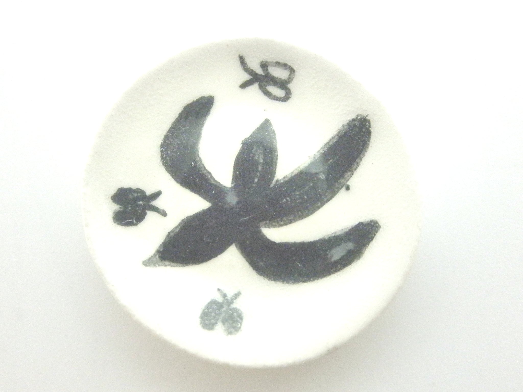 Miniature ceramic plate black and white with butterflies