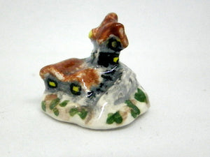 English ceramic cottage with tower