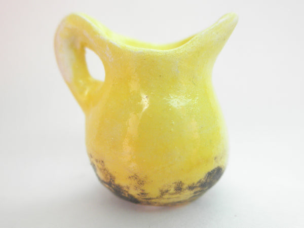 Miniature pitcher yellow brown